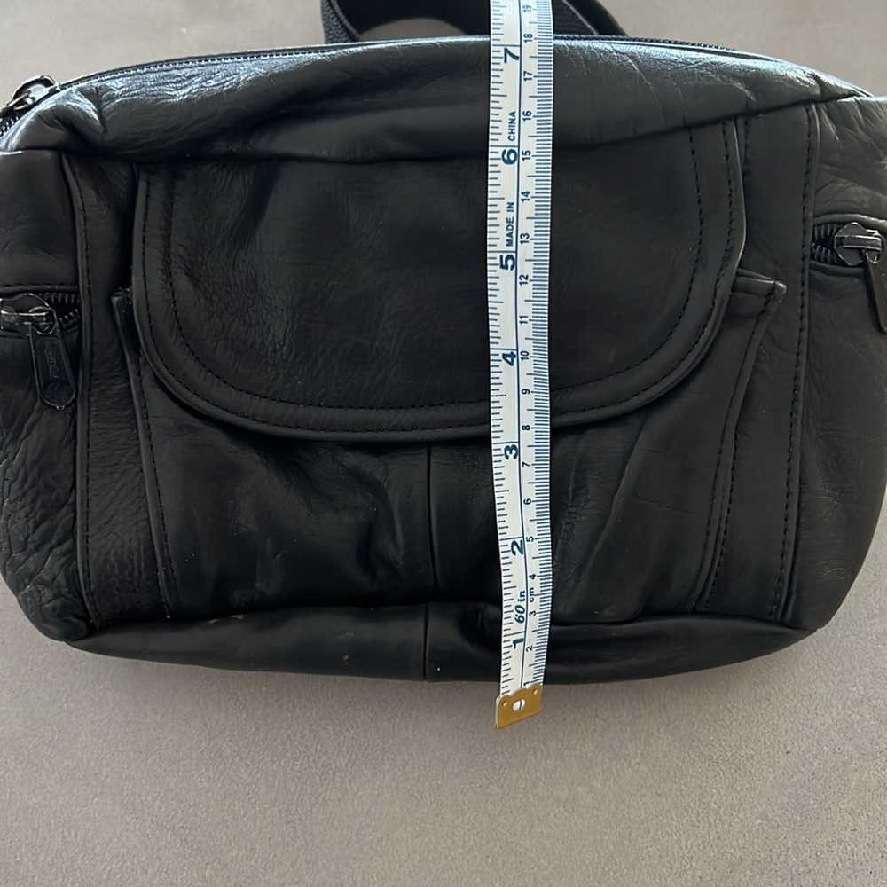 Like new black leather Fanny pack with multiple zippered compartments. - Picture 8 of 8